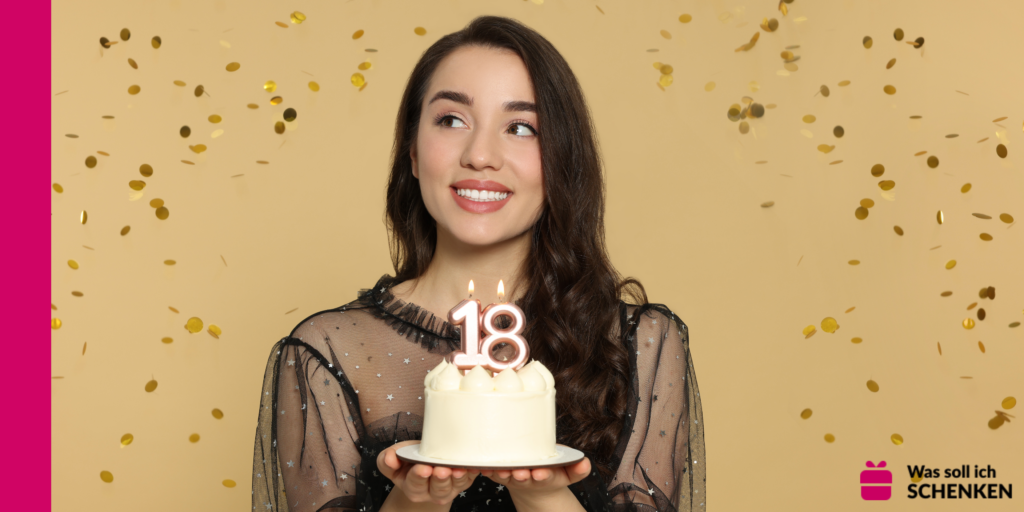 Junge Frau mit einer Torte zum 18. Geburtstag
